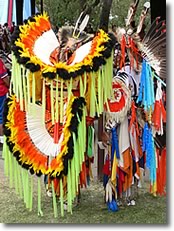 Pow Wow dancers with Fancy Dance bustles